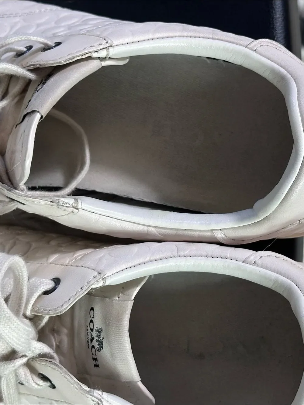 Coach Women's cream leather Signature Embossed Sneakers